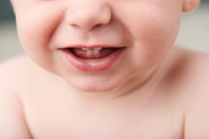 How To Look After Your Baby's First Teeth And Their Gums